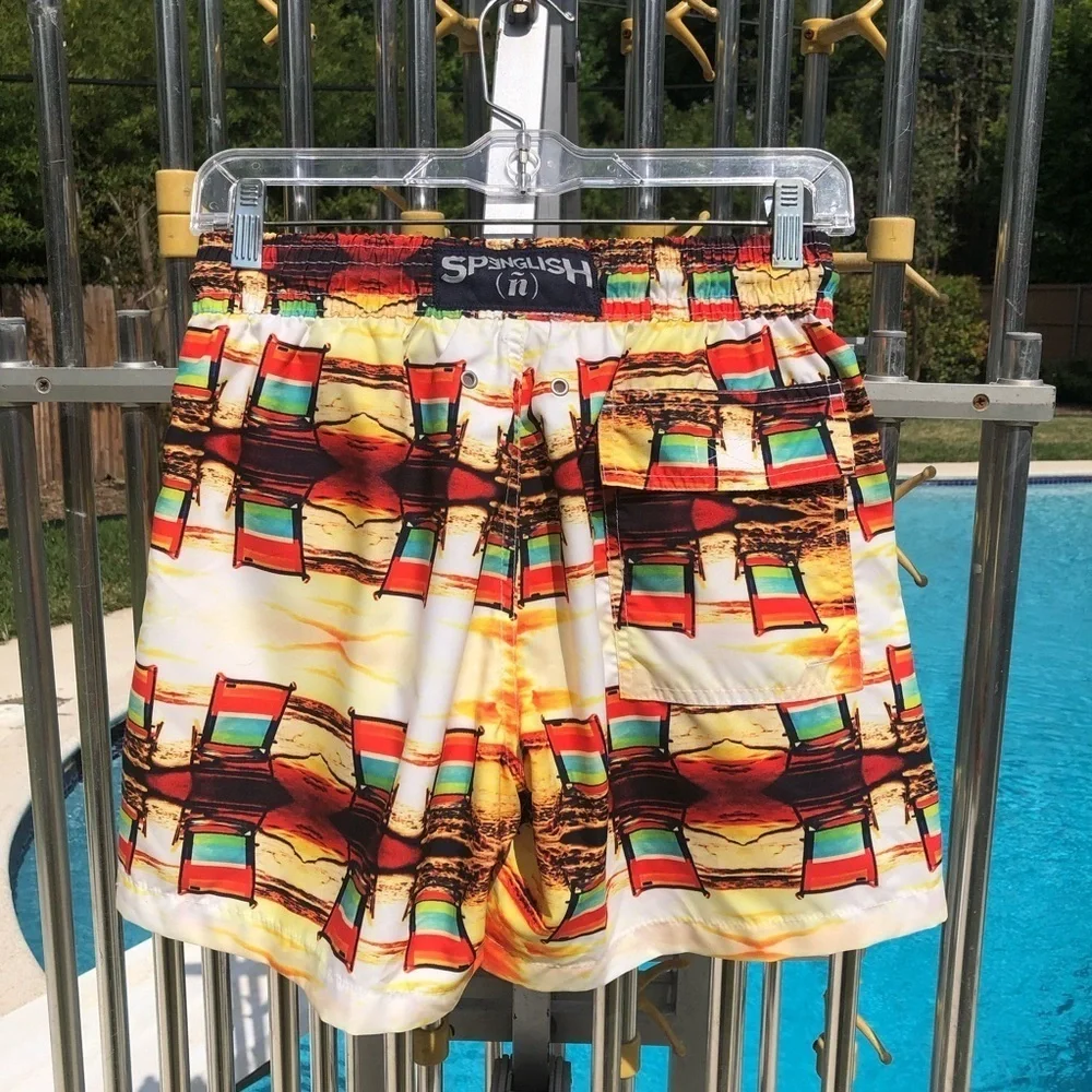 Spenglish tropical swim trunks.